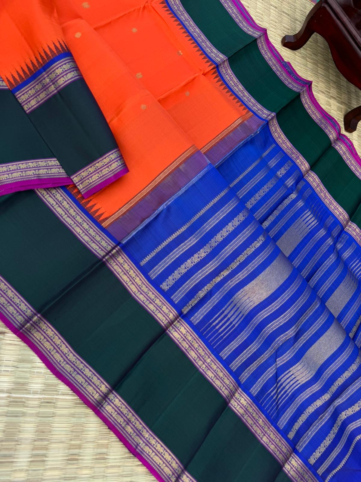 The Korvai Vibes - Authentic Korvai Kanchivaram - gorgeous orange body and forest green borders with royal blue intricate pallu and blouse
