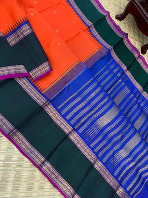 The Korvai Vibes - Authentic Korvai Kanchivaram - gorgeous orange body and forest green borders with royal blue intricate pallu and blouse