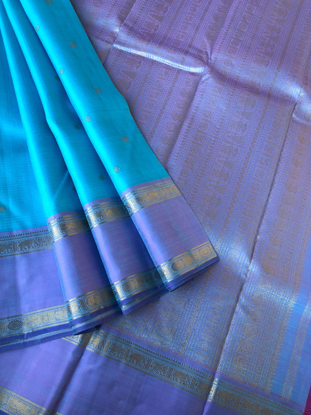 Pastel Ragas on Kanchivaram - gorgeous pastel baby blue and pastel lavender flower Vairaoosi kattam woven body with retta pett woven borders