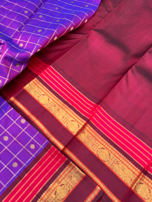 Vintage Ragas on Kanchivaram - a dual tone red short violet with all traditional elements of Kanchivaram in one saree !! Kattam buttas moppula everything
