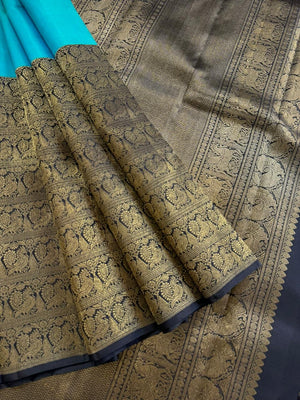 Tasteful Tall Border Kanchivarams - lovely dual tone blue and black with long zari woven one side korvai borders with grand pallu