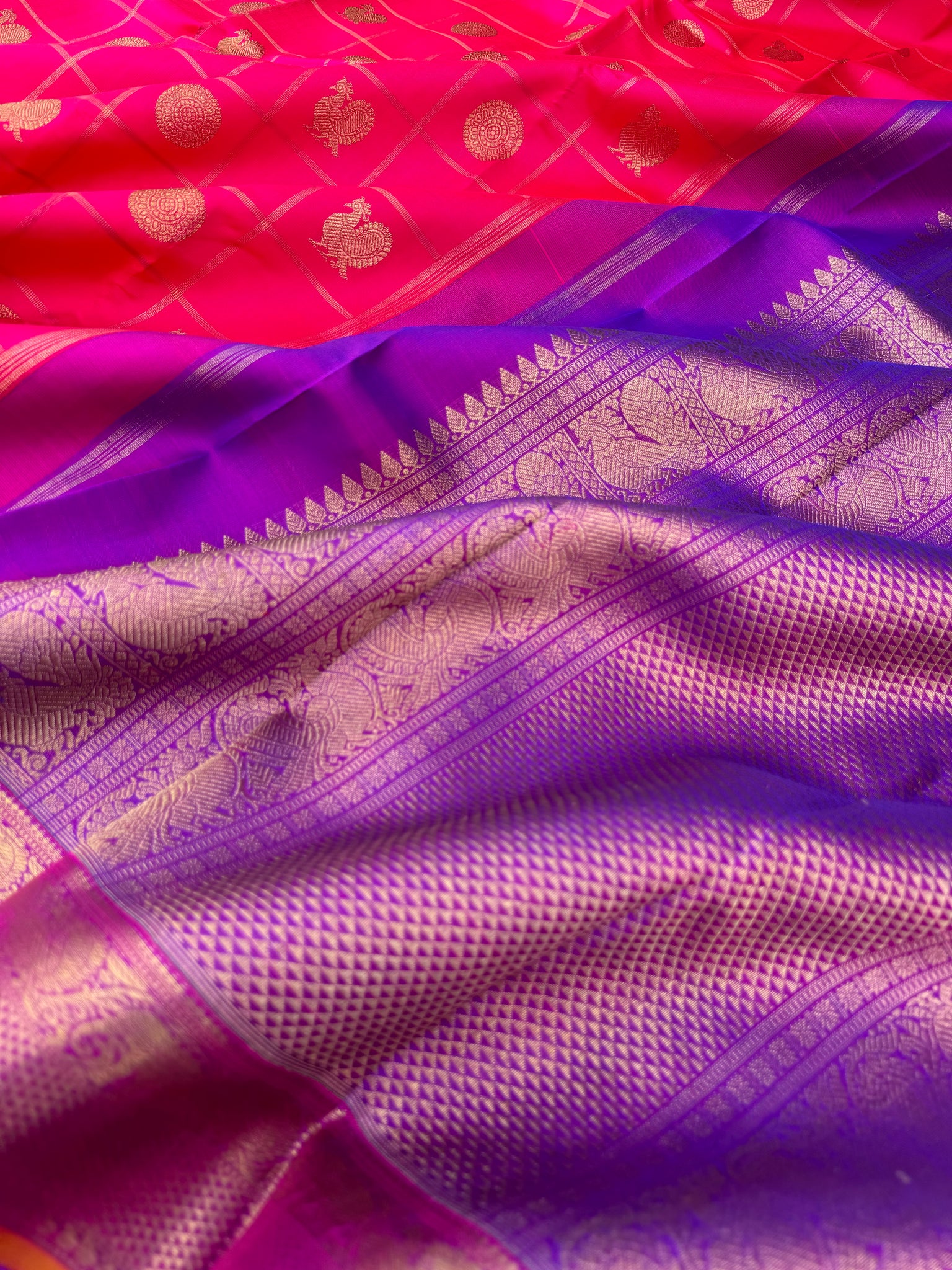 Roja - shades of red orange pink Kanchivarams - stunning pink and violet mayil chackaram