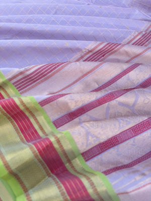 Pastels on Zari Kissed Silk Cotton - a most beautiful pastel lavender muthukattam and buttas woven together the best part is the apple green