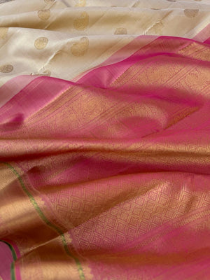 Swarnam - Stunning Solid Border Kanchivarams - off white with a tinch of gold tone body with baby pink pallu