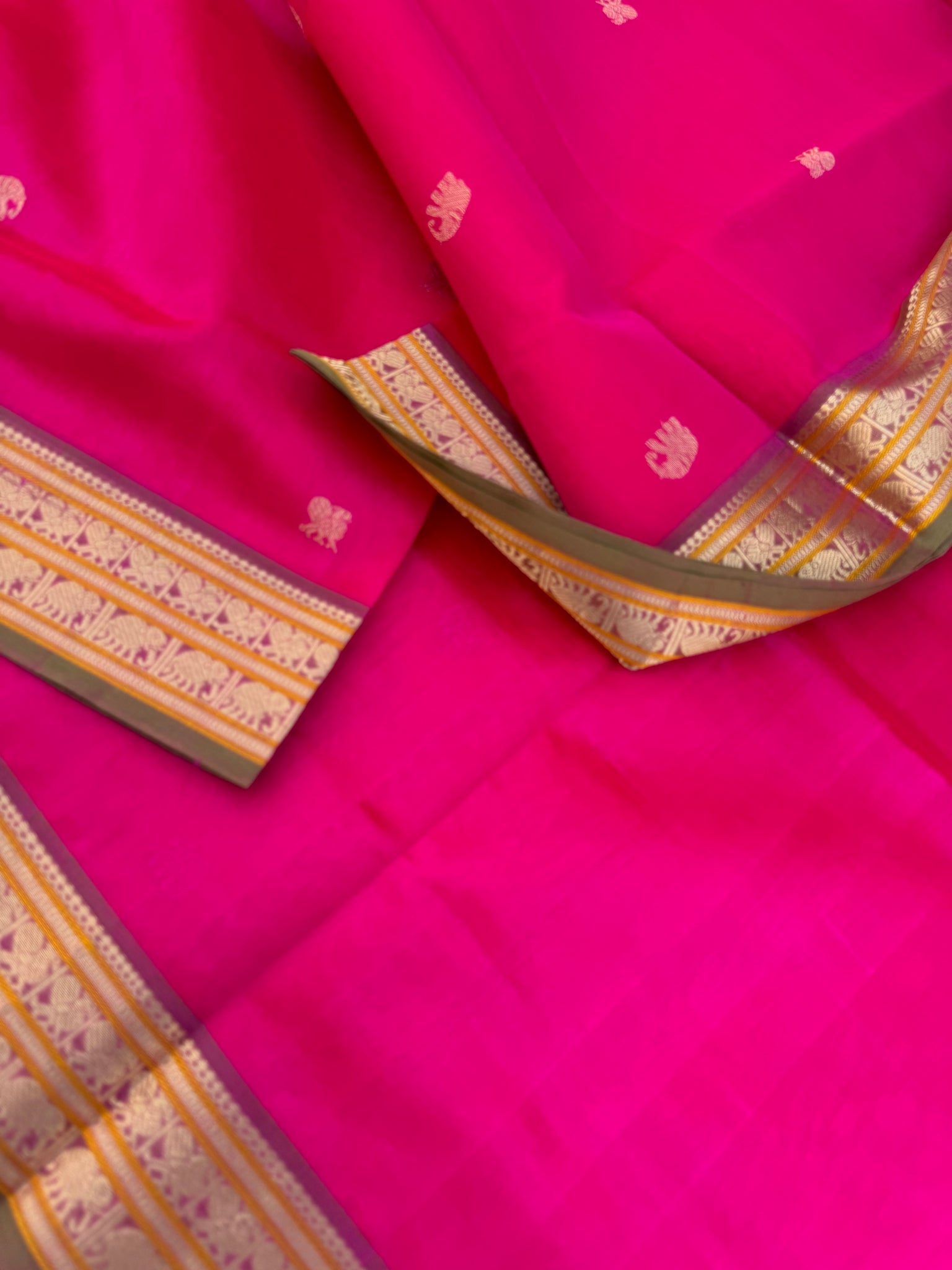 Zari Kissed Silk Cotton -gorgeous pink with parrots woven in the junction of pallu and body