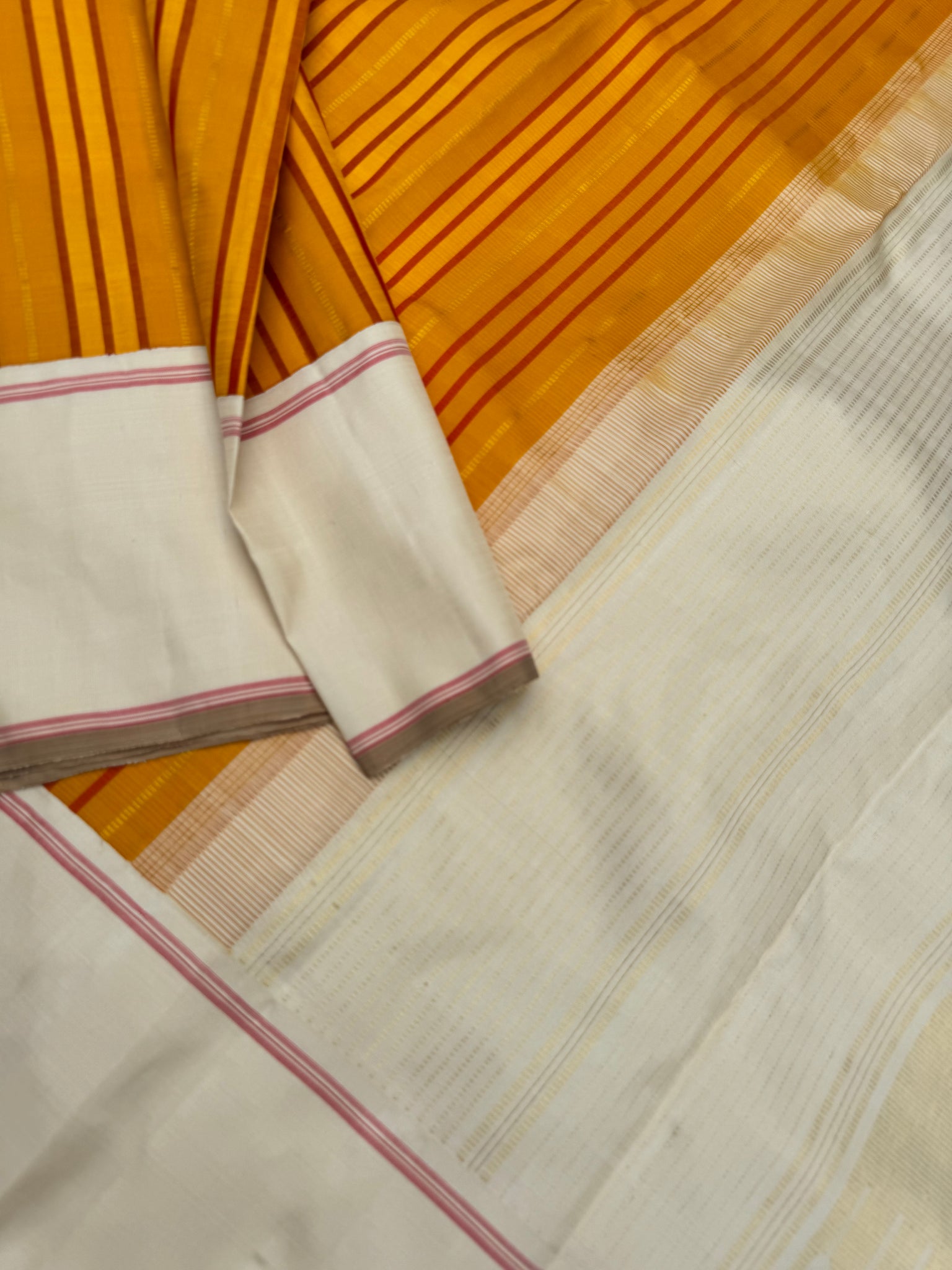 Diwali Edits - Soulful Kanchivaram - absolutely brilliant mustard with red and gold zari strips woven body with off white borders pallu and blouse