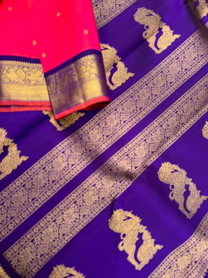Meenakshi - Heirloom Korvai Kanchivaram - a beautiful kanakambaram pink mixed orang tone with deep ink violet yali pallu