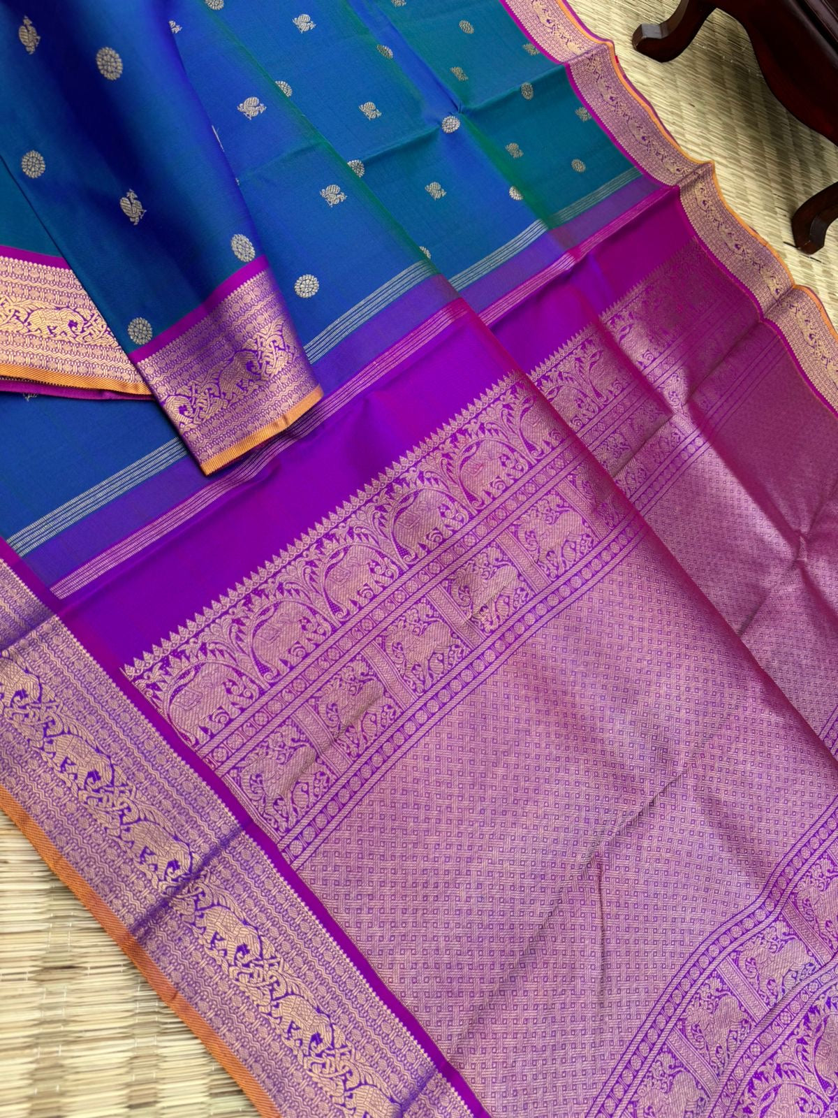 Valli - stunning peacock blue green with violet woven borders and pallu with traditional elephant woven borders