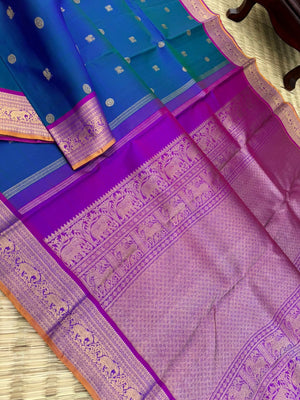 Valli - stunning peacock blue green with violet woven borders and pallu with traditional elephant woven borders