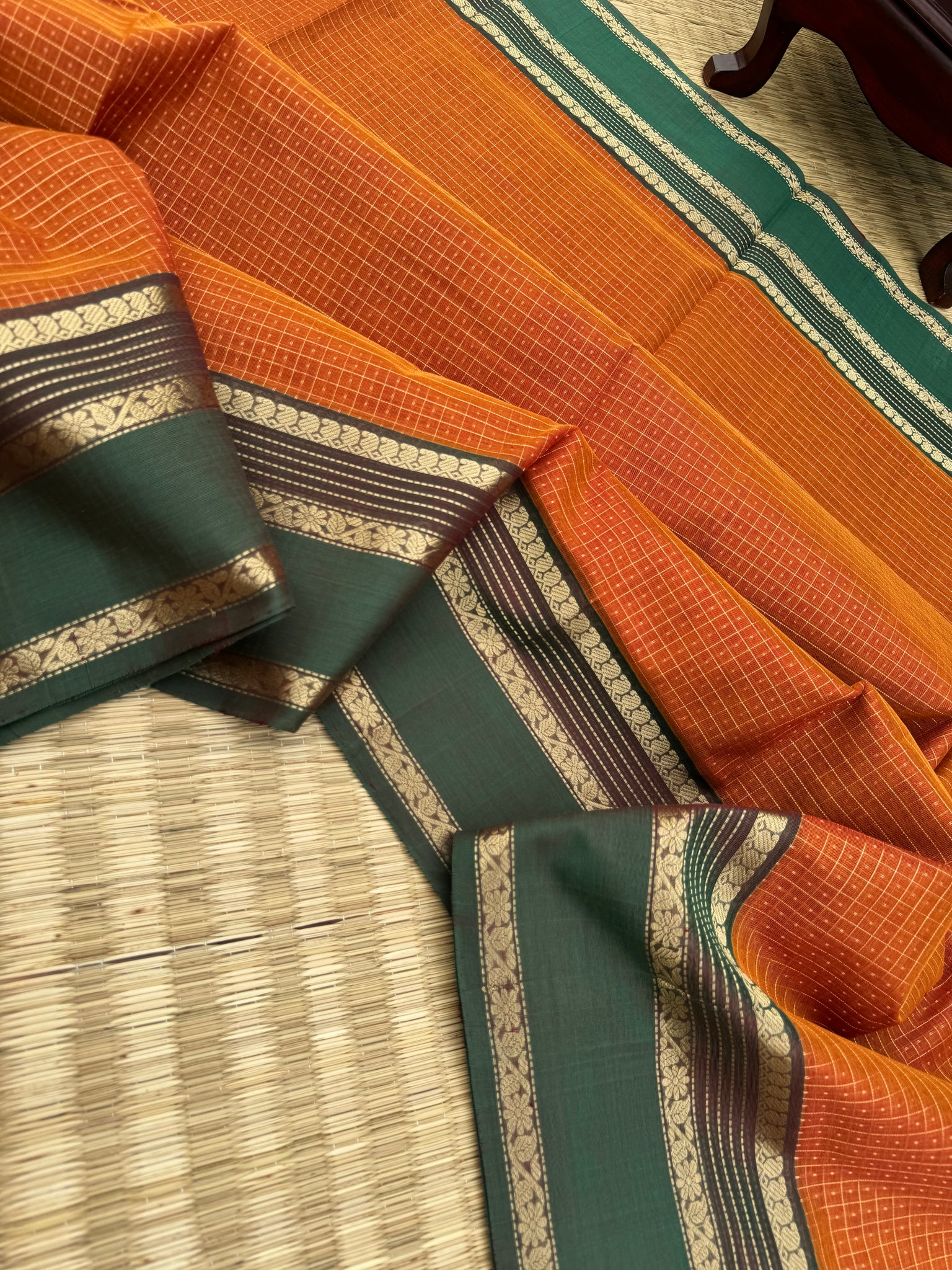 Zari Kissed Silk Cotton - rust orange and short green lakshadeepam with grand long killi woven pallu