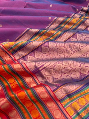 Zari Kissed Silk Cotton - a stunning dual tone red short blue three row of laddu kamalam motifs
