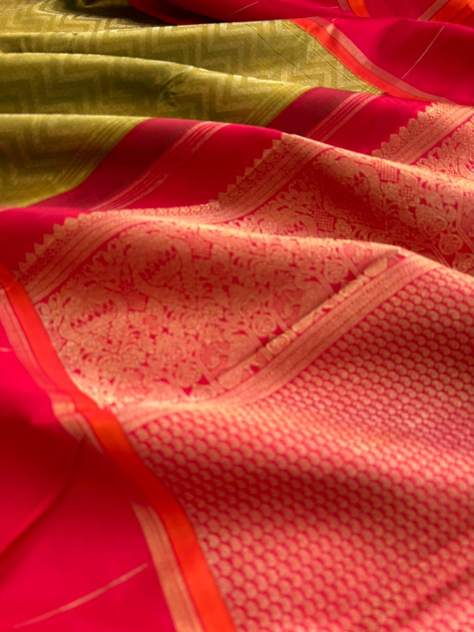 Tasteful Tall Border Kanchivarams - beautiful green and gold full body chevron V pattern with tomato red long korvai woven borders