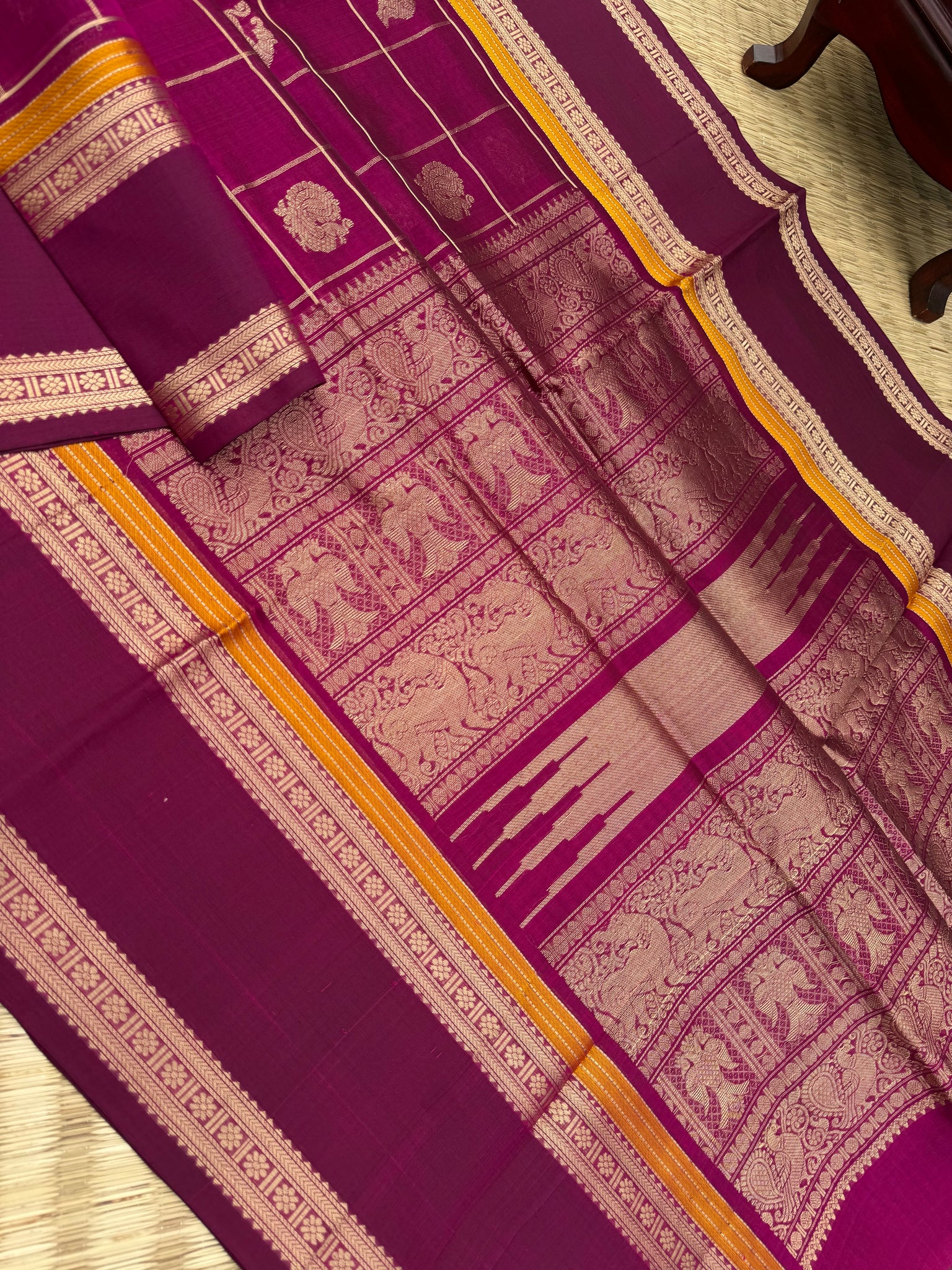 Zari Kissed Silk Cotton - a gorgeous majentha with annam yali and irruthalai pakshi woven buttas