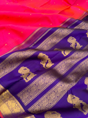 Meenakshi - Heirloom Korvai Kanchivaram - a beautiful kanakambaram pink mixed orang tone with deep ink violet yali pallu