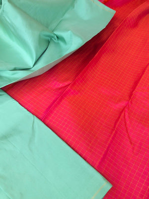 Mohaa - Beautiful Borderless Kanchivarams - stunning pastel pista green plain body with orangish pink zari chexs pallu and blouse