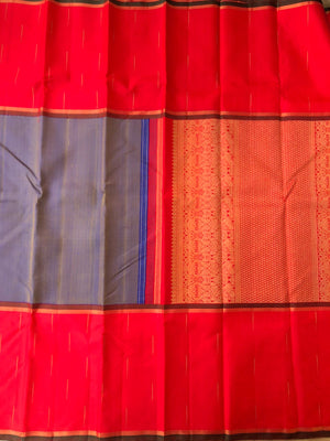 Yarn play on Kanchivaram - unusual and unique mubbagam with rain drops woven borders and dual tone thread woven body