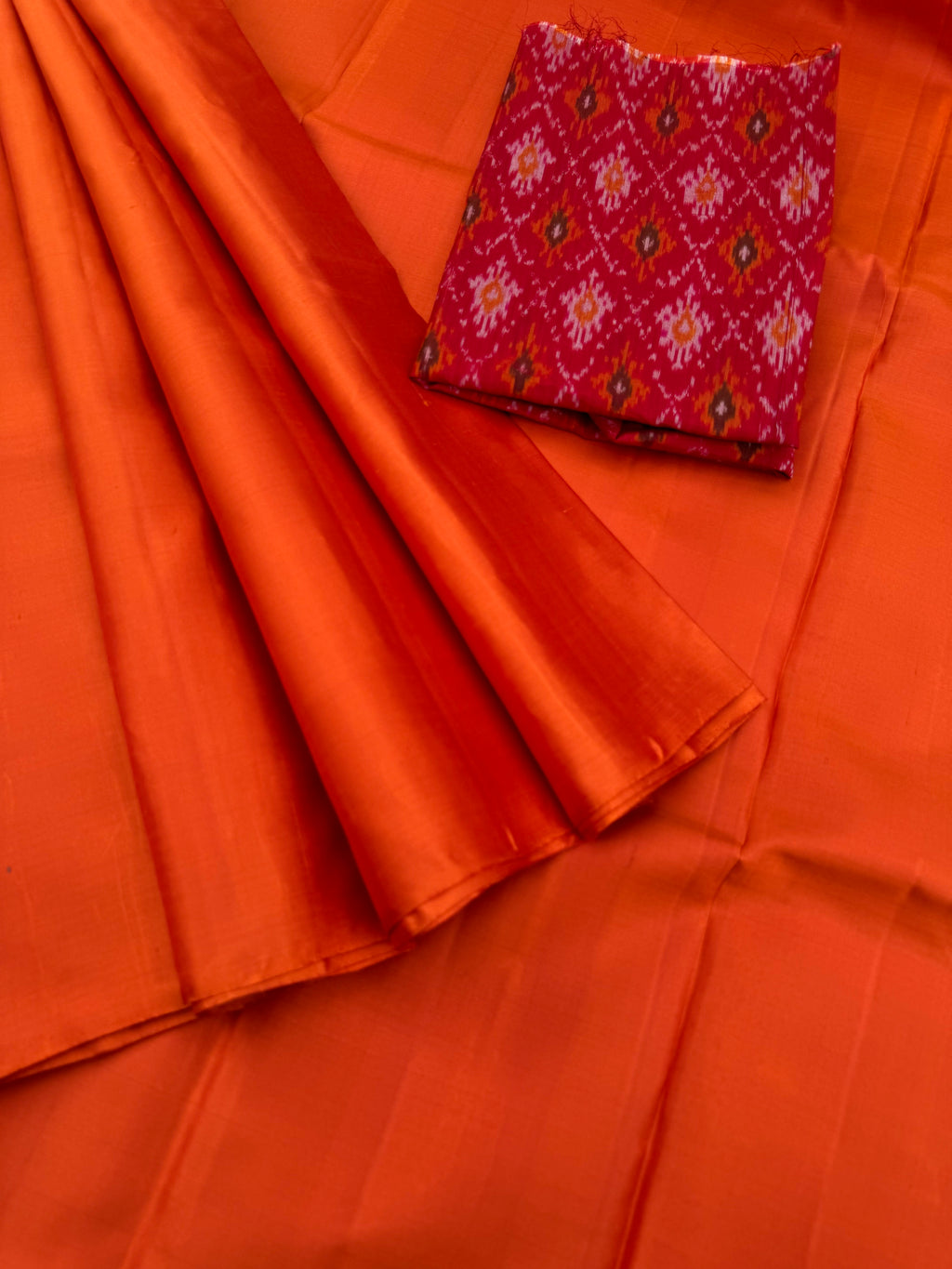 Niram - Celebrating of Full Plain Kanchivaram Silks Paired with Beautiful Blouses - rust orange saree with silk ikkat dark red blouse
