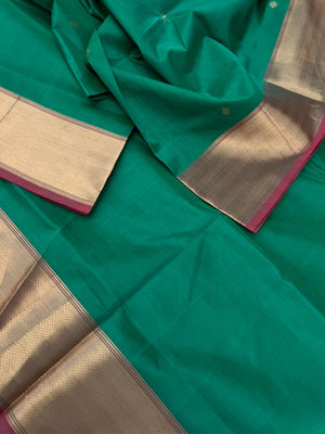 Zari Kissed Silk Cotton - leaf green with solid borders and grand pallu with corner buttas