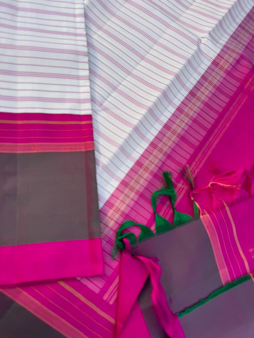 Recipe of Rarest Korvai Kanchivaram - off white stripes woven body with pink and short green korvai borders