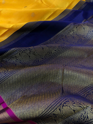Tara - Traditional Colours on Traditional Kanchivarams - stunning mustard with dark blue pallu and buttas woven blouse