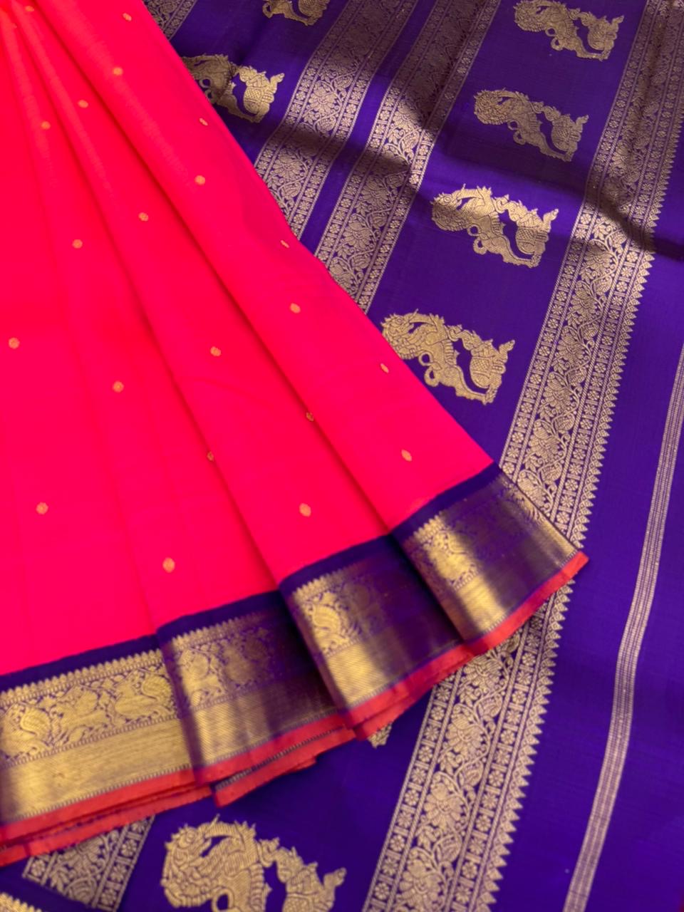 Meenakshi - Heirloom Korvai Kanchivaram - a beautiful kanakambaram pink mixed orang tone with deep ink violet yali pallu