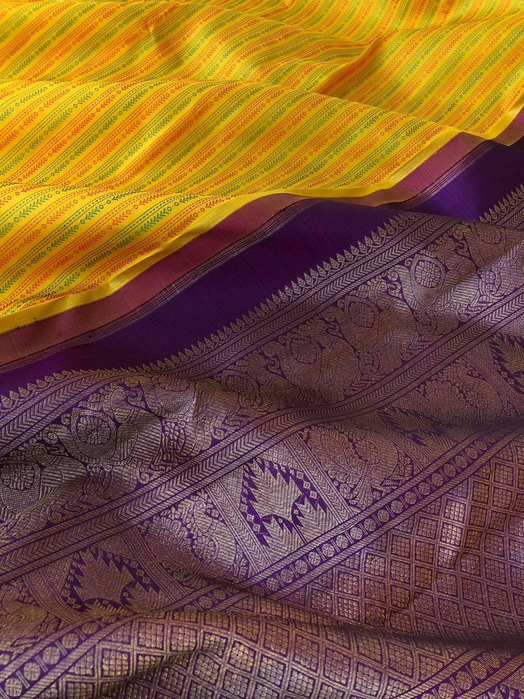 Mohaa - Beautiful Borderless Kanchivarams - stunning yellow and deep purple with full body woven vertical stripes in red and green tone