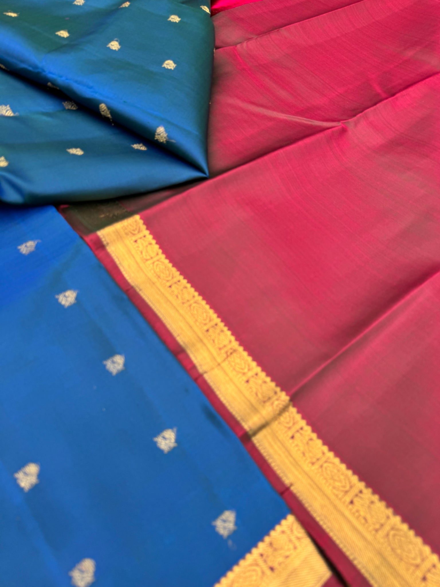 Swarnam - Small Border Kanchivaram -a deep dark peacock blue on rusty ...
