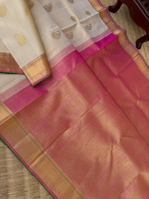 Swarnam - Stunning Solid Border Kanchivarams - off white with a tinch of gold tone body with baby pink pallu