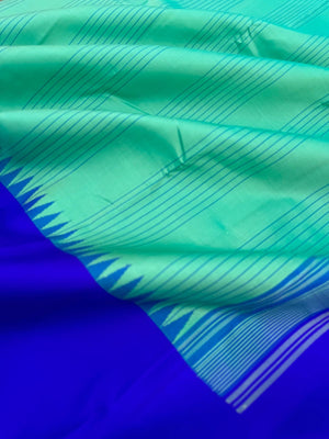 The Best of No Zari Korvai Kanchivaram - a stunning aqua and ms blue with vertical stripes woven body