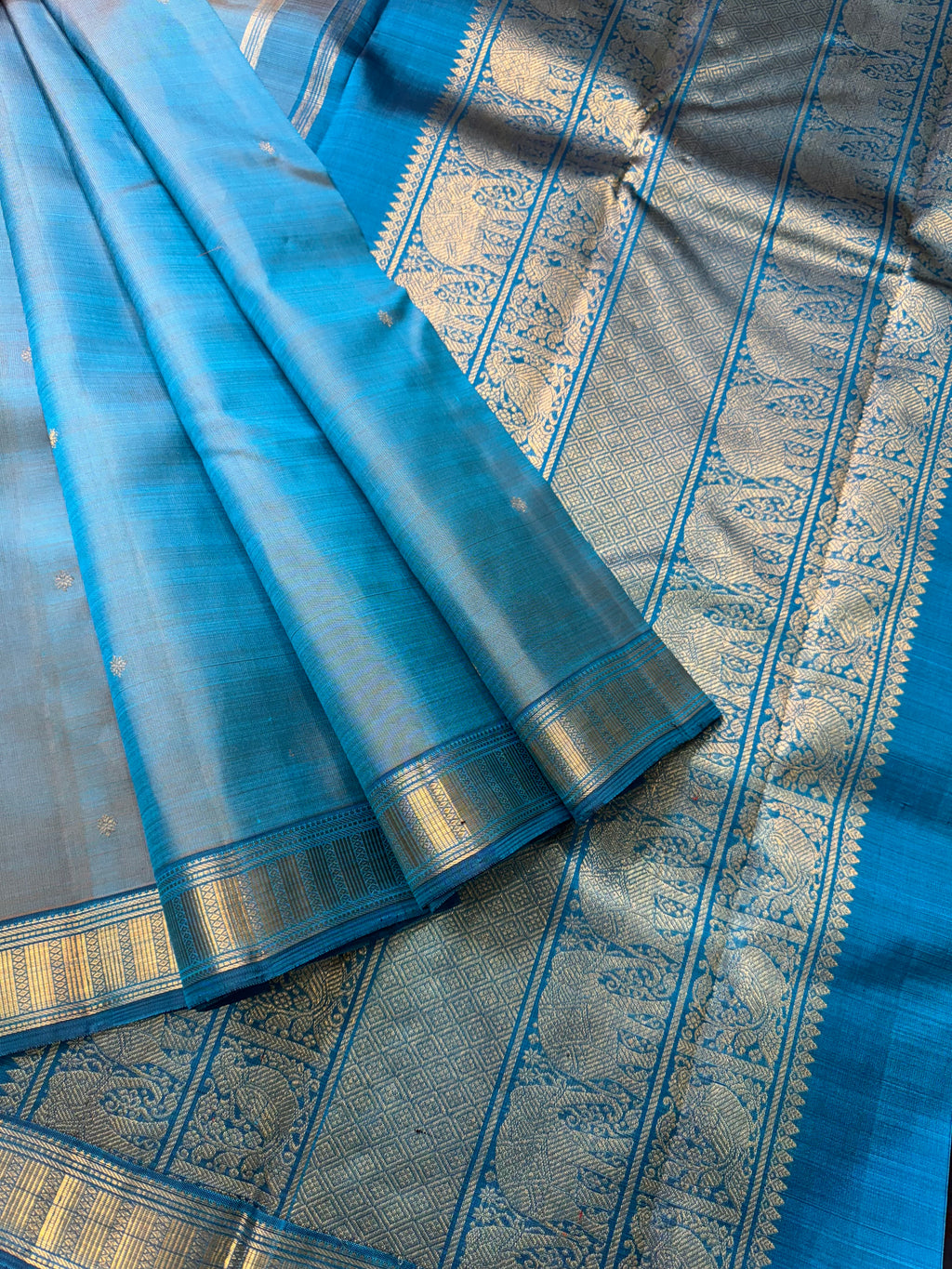Leela - The bliss of small border Kanchivarams - a dual tone English powder blue at the best