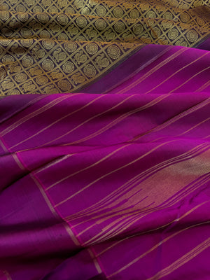 Haritham - Heirloom Yarn Play on Kanchivaram - a black and beige 1000 buttas with majenta pallu and blouse
