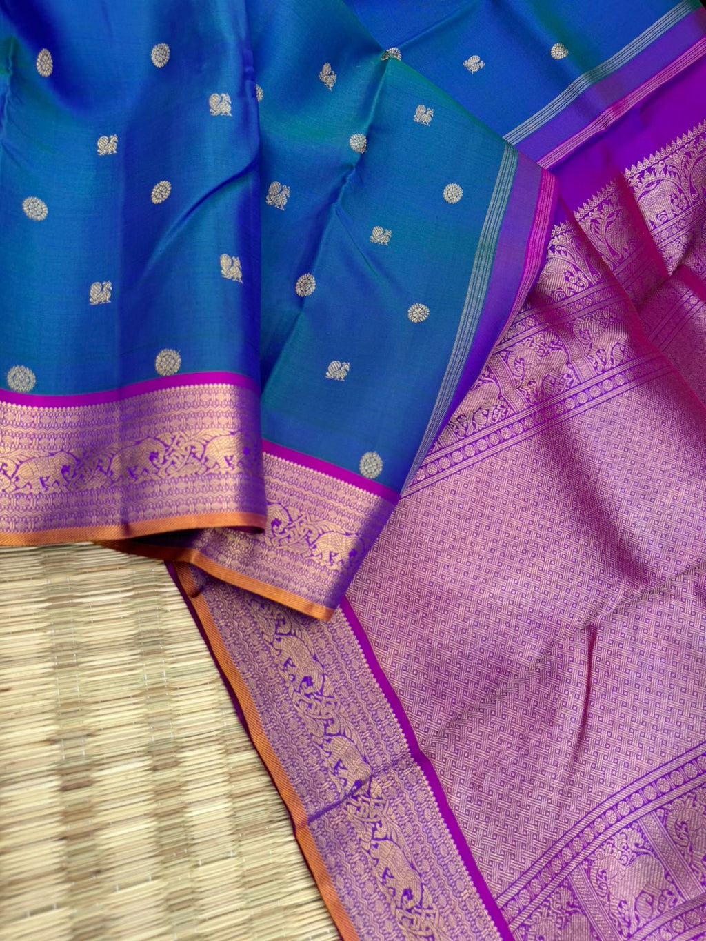 Valli - stunning peacock blue green with violet woven borders and pallu with traditional elephant woven borders
