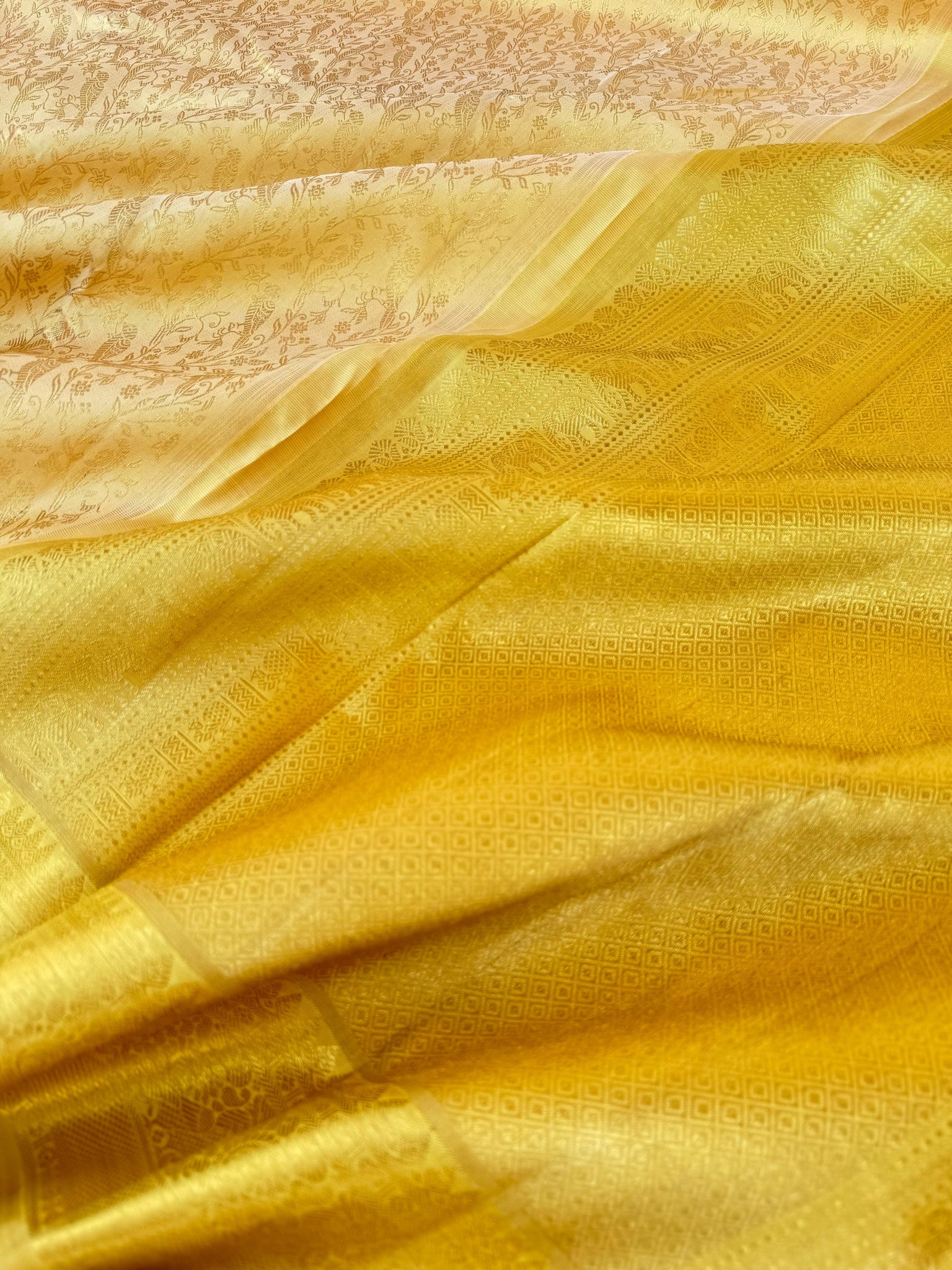 Aandal - The grandeur Kanchivaram - gorgeous butter and gold tone full body end to end zari woven parrots body