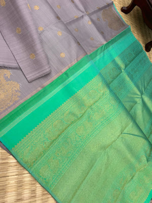 Mohaa - Rarest Borderless Kanchivarams -stunning silver grey and dual tone aqua