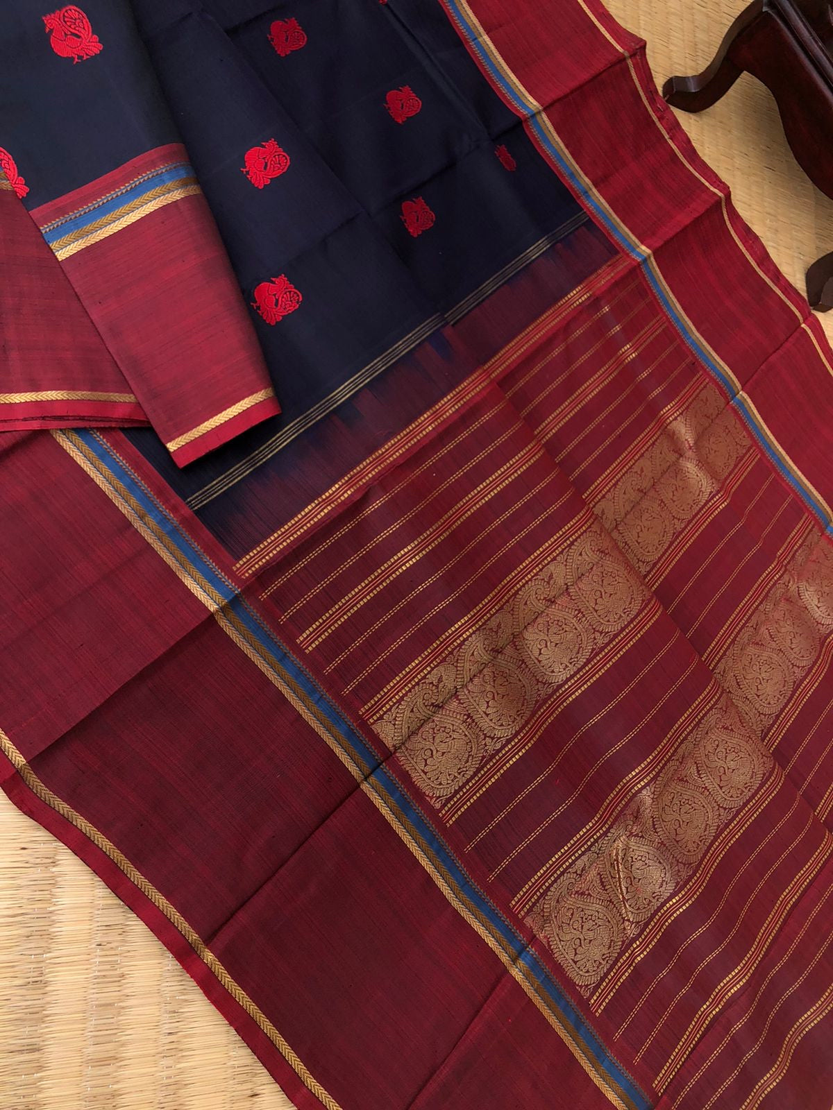 Kaavyam on Kanchivaram - the one of a kind deep mid night black blue body with annapakshi woven buttas with deep maroon borders pallu and blouse