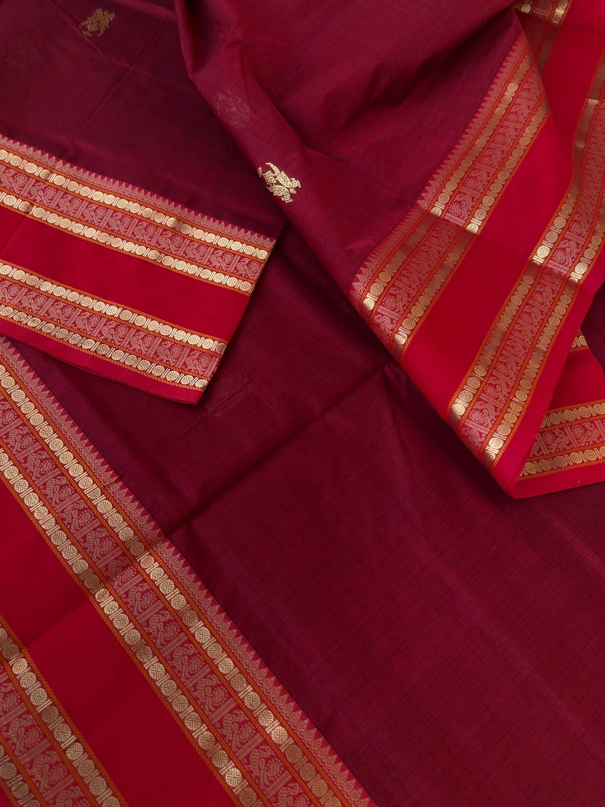 Zari Kissed Silk Cotton - stunning deep reddish maroon with Irruthalaipakshi woven buttas
