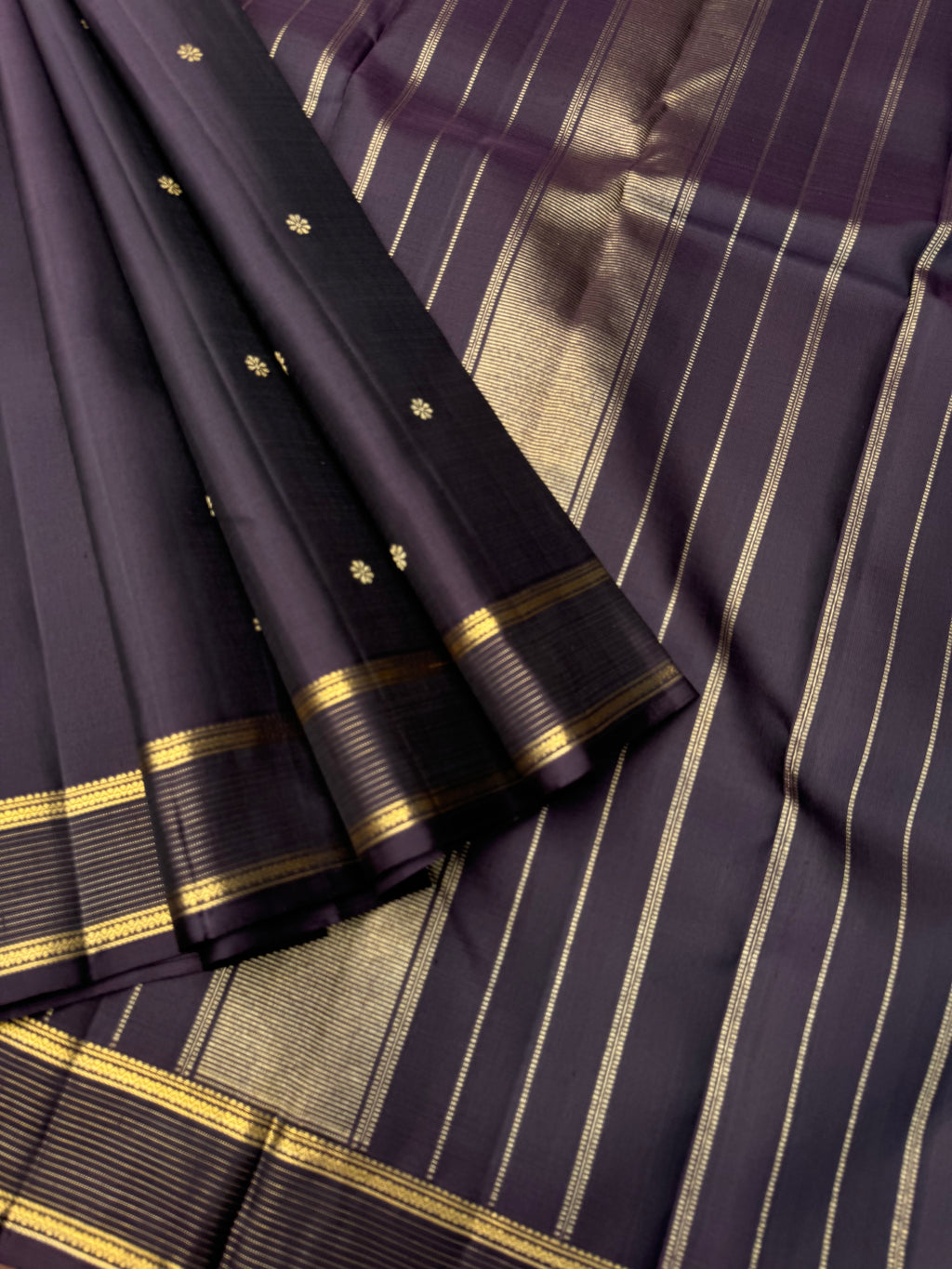 Aadthyayam – The Everyday Kanchivaram - a dark deep betel nut brown with vairaoosi boder with stunning buttas woven body