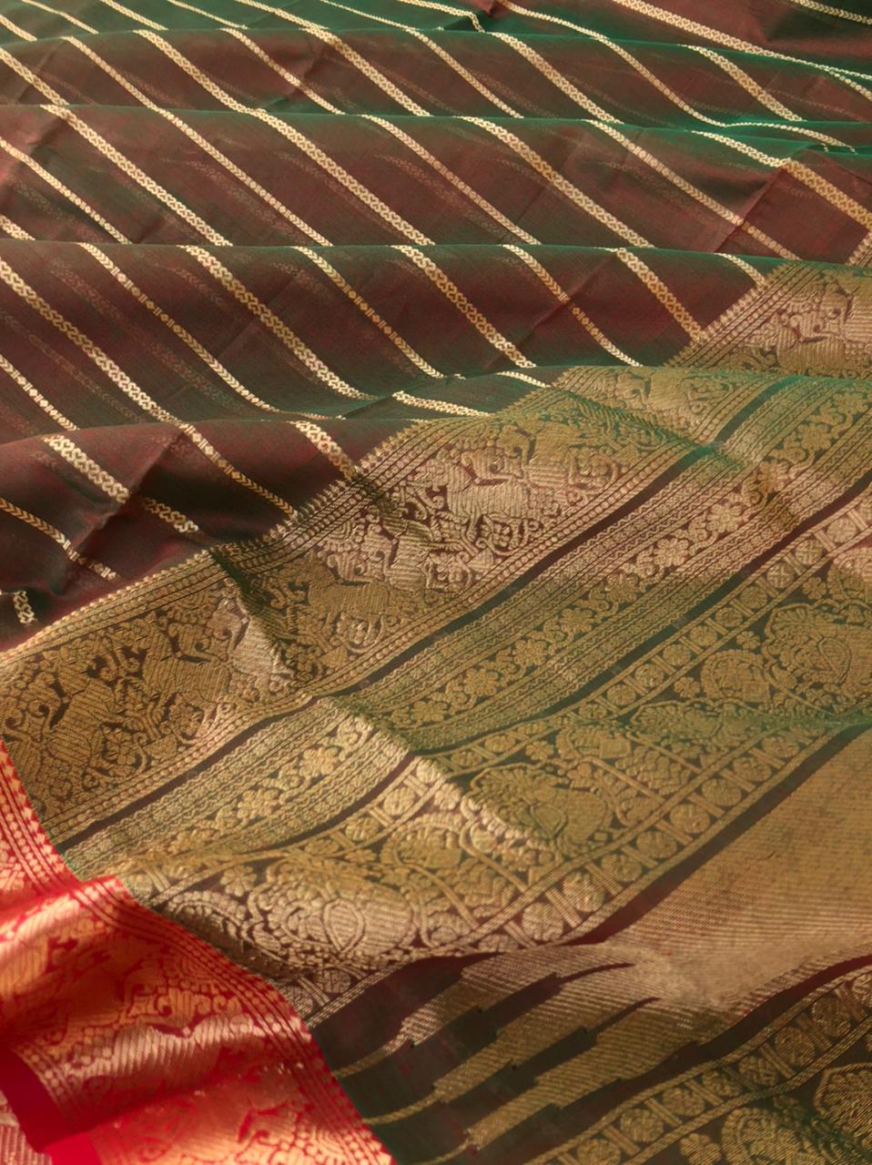 Zari Kissed Silk Cotton - absolutely beautiful dual tone new mango leaf veldhari with yali woven borders