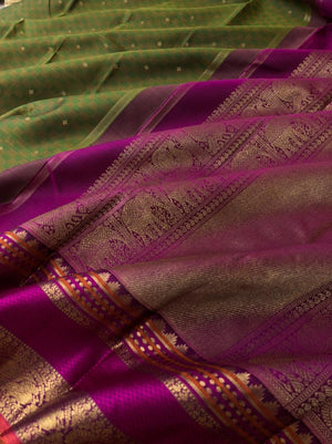 Vintage Ragas on Kanchivaram - the one of a kind deep algae green mat chexs woven body with vintage style woven borders