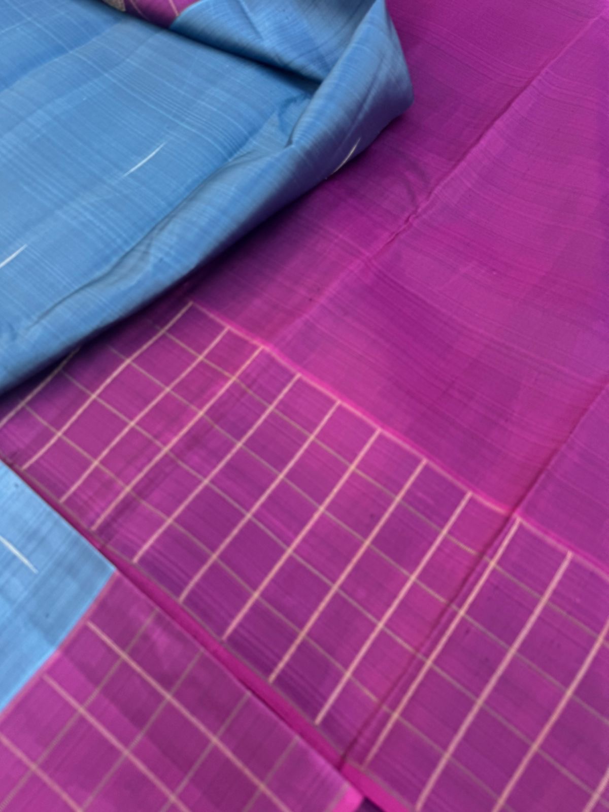 Shree - Simple and Elegant Kanchivarams - a bluish grey tone kanchivaram with raindrops woven buttas with yali and rudurakasham buttas woven chex borders