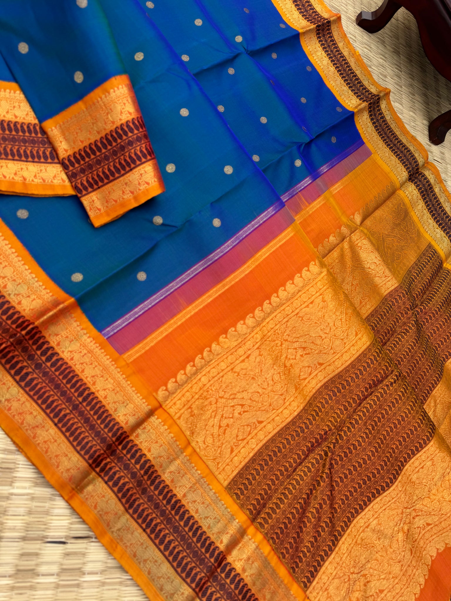 Aarambam - Where Tradition Begins - a classy peacock blue green body with vintage mustard zari and silk thread woven borders and pallu