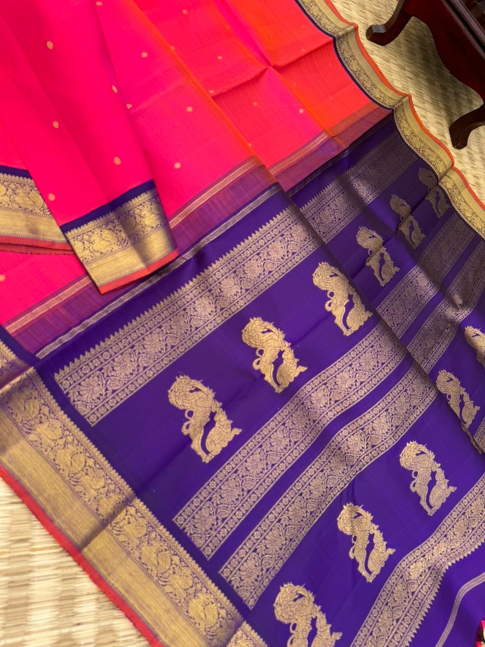 Meenakshi - Heirloom Korvai Kanchivaram - a beautiful kanakambaram pink mixed orang tone with deep ink violet yali pallu