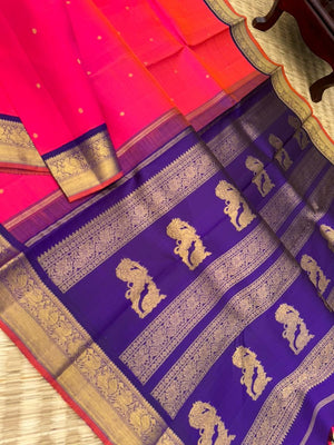 Meenakshi - Heirloom Korvai Kanchivaram - a beautiful kanakambaram pink mixed orang tone with deep ink violet yali pallu