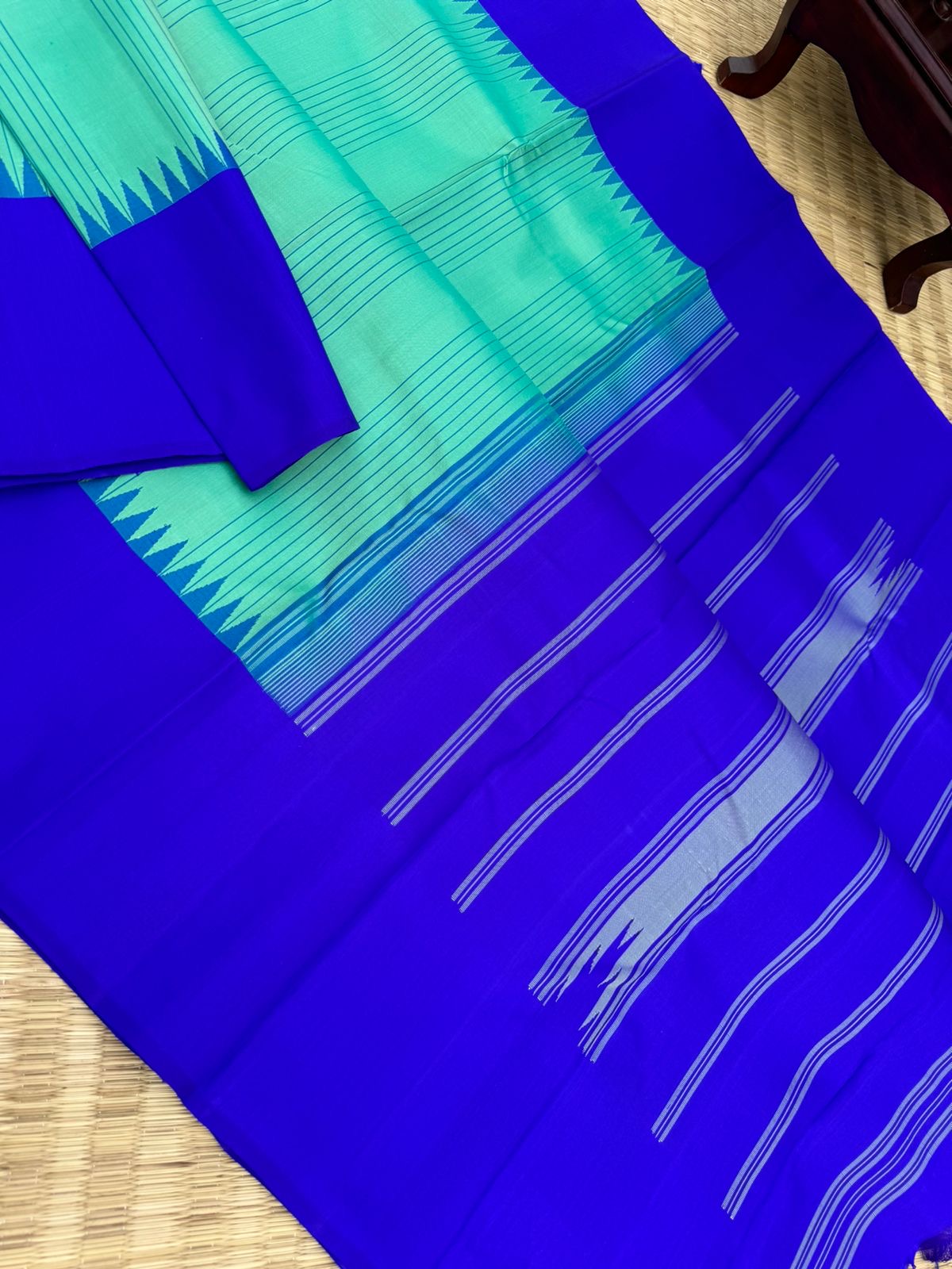 The Best of No Zari Korvai Kanchivaram - a stunning aqua and ms blue with vertical stripes woven body