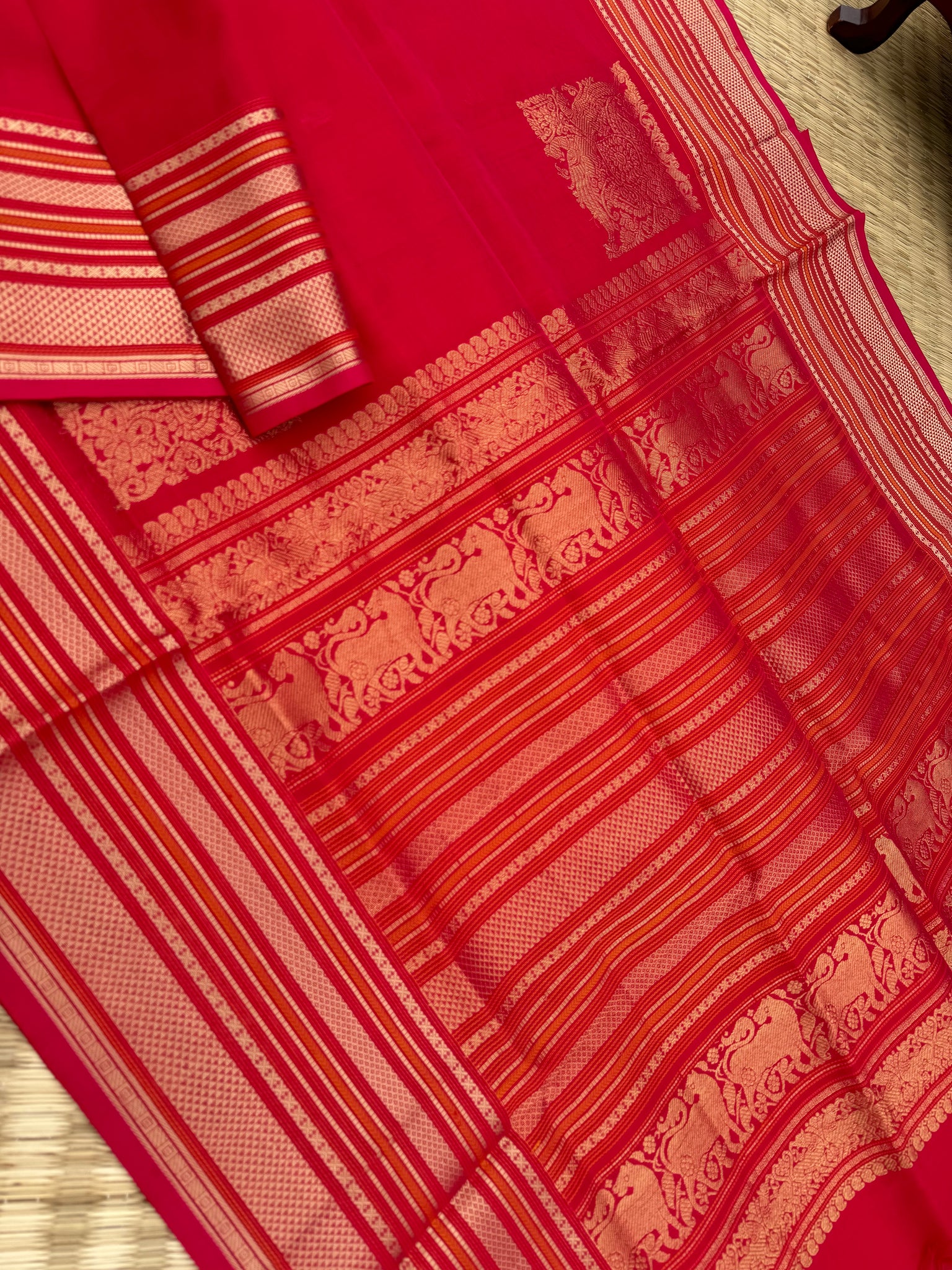 Zari Kissed Silk Cotton - tomato red grand borders and pallu with corner buttas