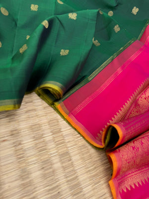 Colour Play on Kanchivaram - deep dark Meenakshi green and pink borderless Kanchivaram