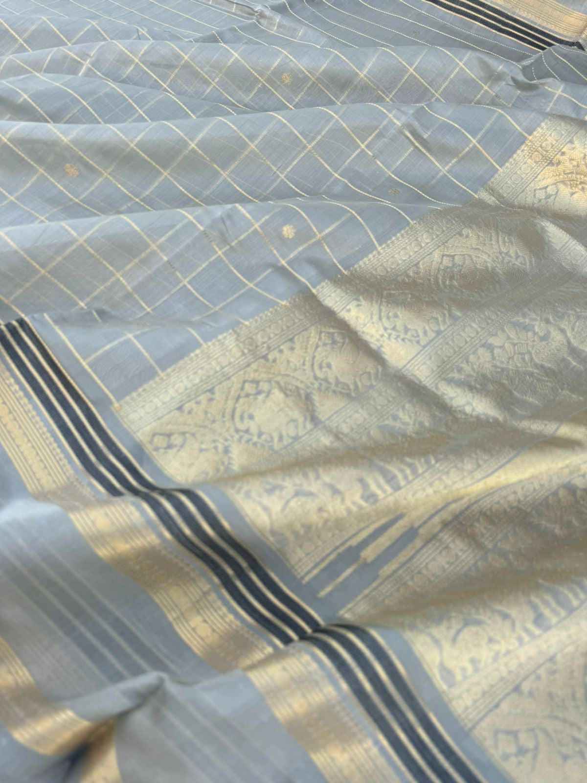 Pastels on Zari Kissed Silk Cotton - a stunning silver grey muthukattam with all traditional elements