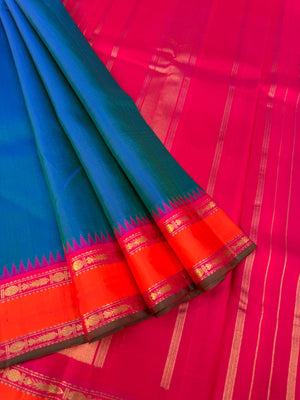 Kamakshi - Heirloom Korvai Kanchivaram - the best of best peacock blue body with orange pink borders and pallu