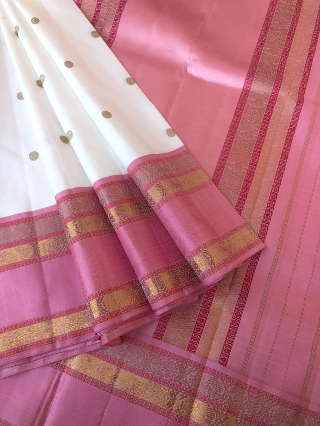 Meenakshi Kalayanam - Authentic Korvai Kanchivarams - the stunning off white and onion pink and the best part is about the Lakshadeepam blouse