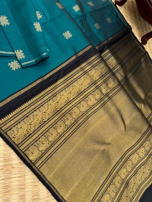 Mohaa - Rarest Borderless Kanchivarams - dark deep burnt blue/green ( a rare tone ) with grand black pallu and blouse